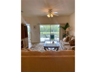 NEW FLOORS IN LIVING AREA! Picture yourself living in a serene on The Preserve Golf Club At Tara in Florida - for sale on GolfHomes.com, golf home, golf lot