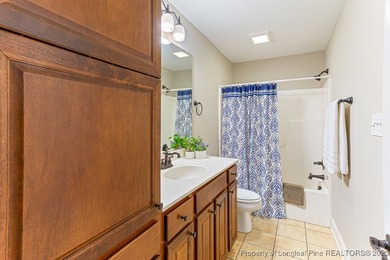 Gates Four - Welcome to this stunning 5-bedroom, 3.5-bath brick on Gates Four Golf and Country Club in North Carolina - for sale on GolfHomes.com, golf home, golf lot