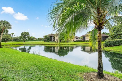 Discover this stunning condo with breathtaking lake and golf on Boca Pointe Country Club in Florida - for sale on GolfHomes.com, golf home, golf lot