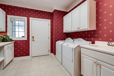 Situated along the premier fairway of Hawks Landing golf course on Hawks Landing Golf Club in Wisconsin - for sale on GolfHomes.com, golf home, golf lot