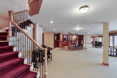 Situated along the premier fairway of Hawks Landing golf course on Hawks Landing Golf Club in Wisconsin - for sale on GolfHomes.com, golf home, golf lot