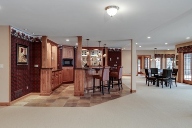 Situated along the premier fairway of Hawks Landing golf course on Hawks Landing Golf Club in Wisconsin - for sale on GolfHomes.com, golf home, golf lot