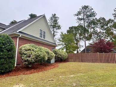Gates Four - Welcome to this stunning 5-bedroom, 3.5-bath brick on Gates Four Golf and Country Club in North Carolina - for sale on GolfHomes.com, golf home, golf lot