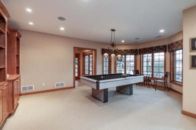 Situated along the premier fairway of Hawks Landing golf course on Hawks Landing Golf Club in Wisconsin - for sale on GolfHomes.com, golf home, golf lot