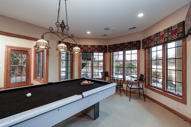 Situated along the premier fairway of Hawks Landing golf course on Hawks Landing Golf Club in Wisconsin - for sale on GolfHomes.com, golf home, golf lot