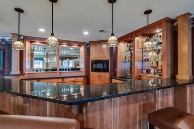 Situated along the premier fairway of Hawks Landing golf course on Hawks Landing Golf Club in Wisconsin - for sale on GolfHomes.com, golf home, golf lot