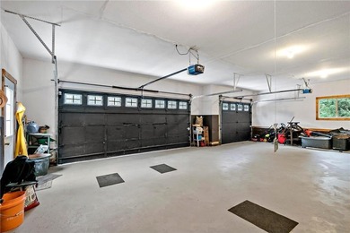 Enjoy easy one-level living on over 1.5 beautifully treed acres on Deacons Lodge Golf Course in Minnesota - for sale on GolfHomes.com, golf home, golf lot