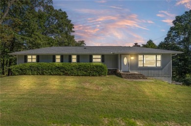Welcome home to this well-maintained split-level residence on Bella Vista Country Club and Golf Course in Arkansas - for sale on GolfHomes.com, golf home, golf lot