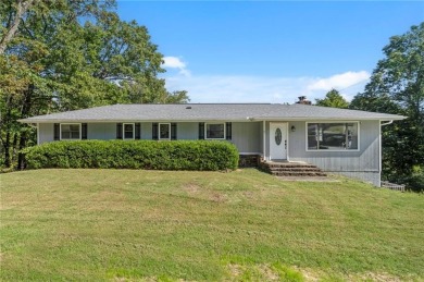 Welcome home to this well-maintained split-level residence on Bella Vista Country Club and Golf Course in Arkansas - for sale on GolfHomes.com, golf home, golf lot