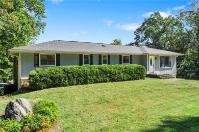 Welcome home to this well-maintained split-level residence on Bella Vista Country Club and Golf Course in Arkansas - for sale on GolfHomes.com, golf home, golf lot