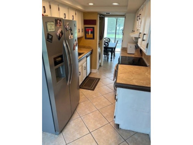 Beautiful 2 bedroom , 2.5 bath upper level townhouse with on  in Florida - for sale on GolfHomes.com, golf home, golf lot
