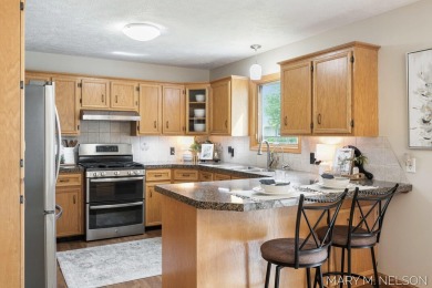 Don't miss this spacious and METICULOUSLY cared for home located on Maple Hill Golf Course in Michigan - for sale on GolfHomes.com, golf home, golf lot