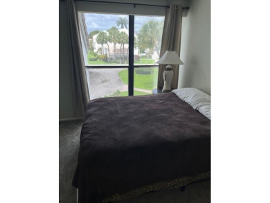 Beautiful 2 bedroom , 2.5 bath upper level townhouse with on  in Florida - for sale on GolfHomes.com, golf home, golf lot