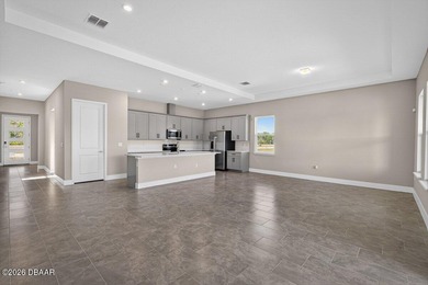 Welcome to The Lydia, a CFB Award-winning home that blends on LPGA International Golf Course in Florida - for sale on GolfHomes.com, golf home, golf lot