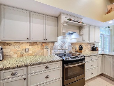 Nestled within the highly sought-after gated community of on East Lake Woodlands Country Club in Florida - for sale on GolfHomes.com, golf home, golf lot