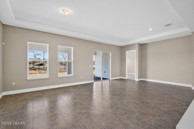 Welcome to The Lydia, a CFB Award-winning home that blends on LPGA International Golf Course in Florida - for sale on GolfHomes.com, golf home, golf lot