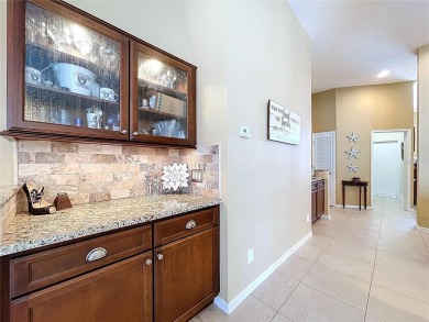 Nestled within the highly sought-after gated community of on East Lake Woodlands Country Club in Florida - for sale on GolfHomes.com, golf home, golf lot