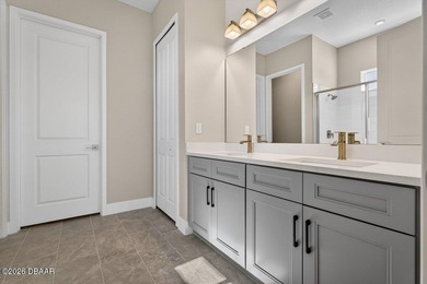 Welcome to The Lydia, a CFB Award-winning home that blends on LPGA International Golf Course in Florida - for sale on GolfHomes.com, golf home, golf lot