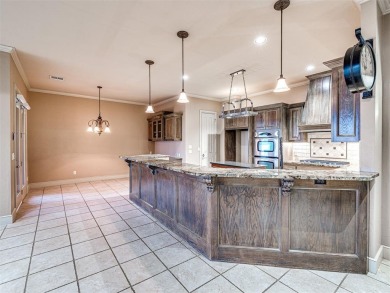 An exquisite villa in the highly sought-after Rose Creek on Rose Creek Golf Club in Oklahoma - for sale on GolfHomes.com, golf home, golf lot