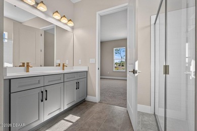 Welcome to The Lydia, a CFB Award-winning home that blends on LPGA International Golf Course in Florida - for sale on GolfHomes.com, golf home, golf lot