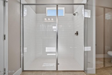 Welcome to The Lydia, a CFB Award-winning home that blends on LPGA International Golf Course in Florida - for sale on GolfHomes.com, golf home, golf lot