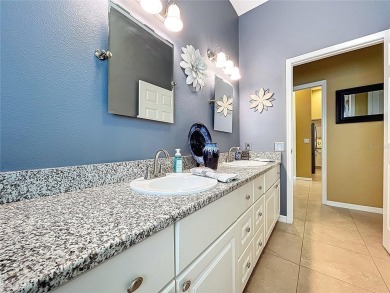 Nestled within the highly sought-after gated community of on East Lake Woodlands Country Club in Florida - for sale on GolfHomes.com, golf home, golf lot
