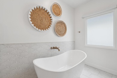 The residence at 18 Commons Court has undergone a comprehensive on Wild Dunes Harbor Golf Resort in South Carolina - for sale on GolfHomes.com, golf home, golf lot