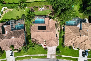 Nestled within the highly sought-after gated community of on East Lake Woodlands Country Club in Florida - for sale on GolfHomes.com, golf home, golf lot