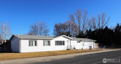 JUST REDUCED!! Come see this gorgeous 3 bedroom 2 bath home in a on Bunker Hill Country Club in Colorado - for sale on GolfHomes.com, golf home, golf lot