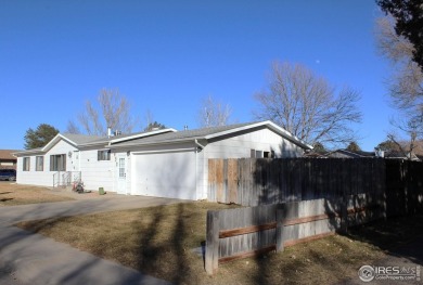 JUST REDUCED!! Come see this gorgeous 3 bedroom 2 bath home in a on Bunker Hill Country Club in Colorado - for sale on GolfHomes.com, golf home, golf lot