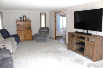 JUST REDUCED!! Come see this gorgeous 3 bedroom 2 bath home in a on Bunker Hill Country Club in Colorado - for sale on GolfHomes.com, golf home, golf lot