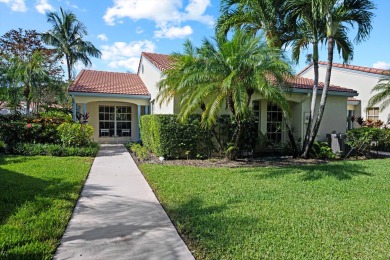 Charming 3-bedroom, 2-bath Las Casita featuring elegant on Palm Beach Polo and Country Club in Florida - for sale on GolfHomes.com, golf home, golf lot