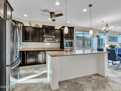 Discover this beautifully upgraded home with coveted golf cart on Sundance Golf Club in Arizona - for sale on GolfHomes.com, golf home, golf lot