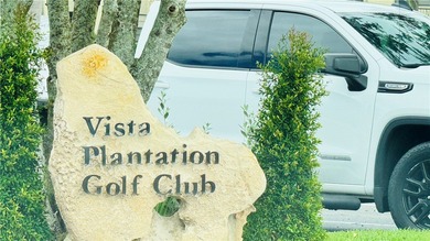 AFFORDABLE LIVING IN DESIRABLE VISTA PLANTATION across from on Vista Plantation Golf Club in Florida - for sale on GolfHomes.com, golf home, golf lot
