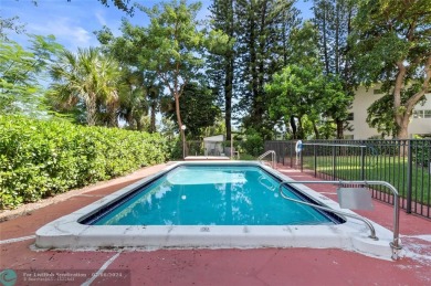 ALL AGES COMMUNITY! Welcome home to this large 2/2 corner unit on Crystal Lake Country Club in Florida - for sale on GolfHomes.com, golf home, golf lot