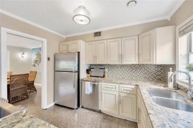 Escape to your secluded South Tampa sanctuary, where mornings on Palma Ceia Golf and Country Club in Florida - for sale on GolfHomes.com, golf home, golf lot