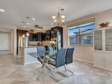 Discover this beautifully upgraded home with coveted golf cart on Sundance Golf Club in Arizona - for sale on GolfHomes.com, golf home, golf lot