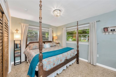 Escape to your secluded South Tampa sanctuary, where mornings on Palma Ceia Golf and Country Club in Florida - for sale on GolfHomes.com, golf home, golf lot