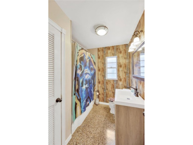Escape to your secluded South Tampa sanctuary, where mornings on Palma Ceia Golf and Country Club in Florida - for sale on GolfHomes.com, golf home, golf lot