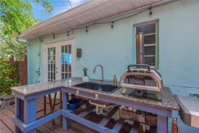 Escape to your secluded South Tampa sanctuary, where mornings on Palma Ceia Golf and Country Club in Florida - for sale on GolfHomes.com, golf home, golf lot