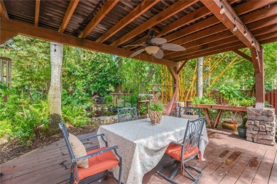 Escape to your secluded South Tampa sanctuary, where mornings on Palma Ceia Golf and Country Club in Florida - for sale on GolfHomes.com, golf home, golf lot