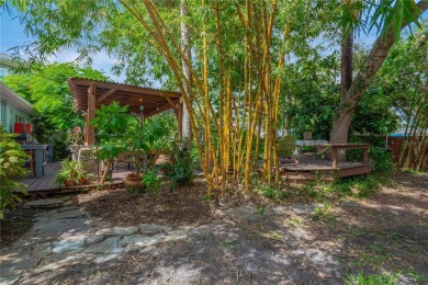 Escape to your secluded South Tampa sanctuary, where mornings on Palma Ceia Golf and Country Club in Florida - for sale on GolfHomes.com, golf home, golf lot