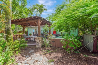 Escape to your secluded South Tampa sanctuary, where mornings on Palma Ceia Golf and Country Club in Florida - for sale on GolfHomes.com, golf home, golf lot