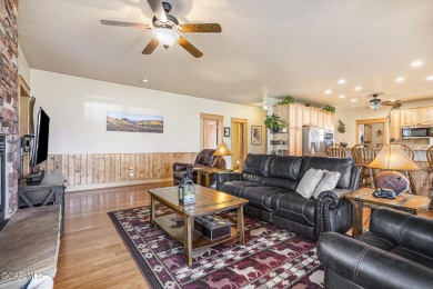 This great ranch style home is in perfect condition! You will on Grand Elk Ranch and Club in Colorado - for sale on GolfHomes.com, golf home, golf lot