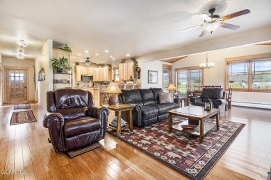 This great ranch style home is in perfect condition! You will on Grand Elk Ranch and Club in Colorado - for sale on GolfHomes.com, golf home, golf lot