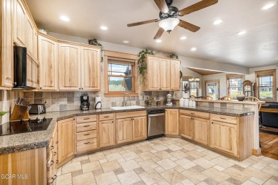 This great ranch style home is in perfect condition! You will on Grand Elk Ranch and Club in Colorado - for sale on GolfHomes.com, golf home, golf lot