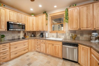 This great ranch style home is in perfect condition! You will on Grand Elk Ranch and Club in Colorado - for sale on GolfHomes.com, golf home, golf lot