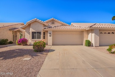 Discover the charm of this inviting 2-bedroom townhome in the on Fountain of the Sun Country Club in Arizona - for sale on GolfHomes.com, golf home, golf lot