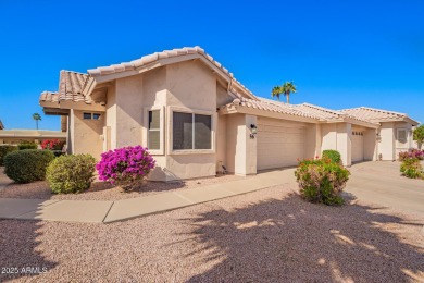 Discover the charm of this inviting 2-bedroom townhome in the on Fountain of the Sun Country Club in Arizona - for sale on GolfHomes.com, golf home, golf lot