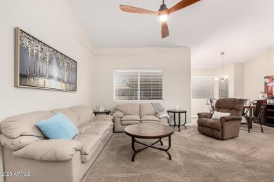 Discover the charm of this inviting 2-bedroom townhome in the on Fountain of the Sun Country Club in Arizona - for sale on GolfHomes.com, golf home, golf lot